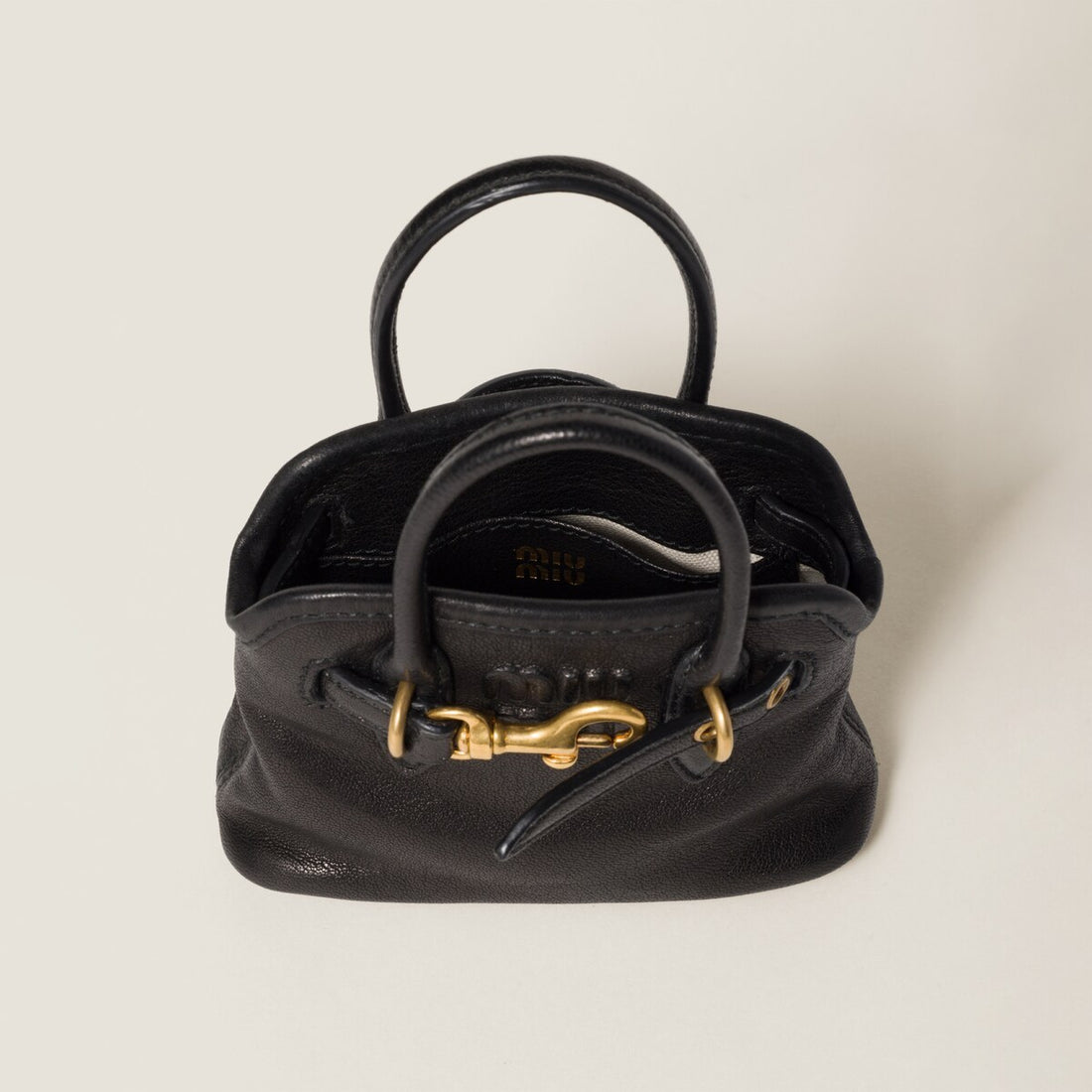 MiuMiu Women's Mini Aventure Leather Bag Jewelry Embossed Logo Zipper Closure Casual Tote Bag Bags #71932